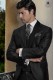 Elegant bespoke black groom suit with modern slim fit, in pure wool fabric, model 1167 Mario Moyano personalized tailoring.