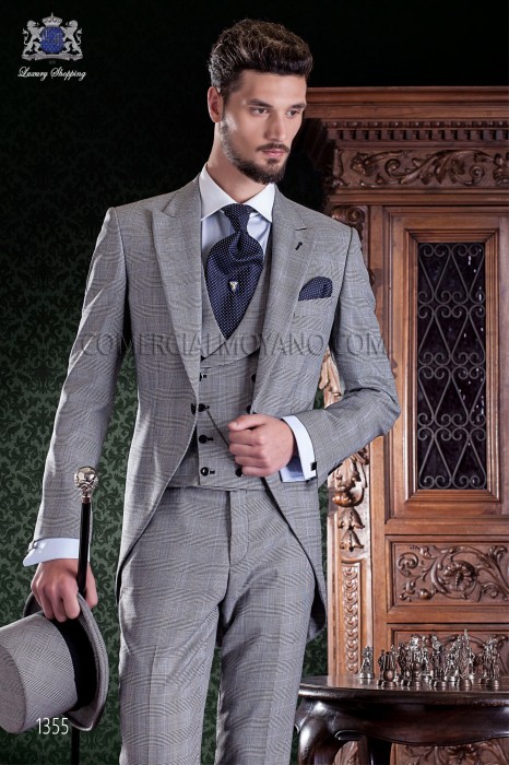 Elégant italienne redingote coupe "Slim". Prince de Galles tissu avec de fines rayures bleues.