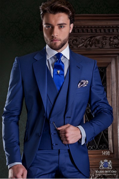 Italian tailoring suit stylish cut "Slim" Match Girl pocket and two buttons. Cool blue wool fabric.