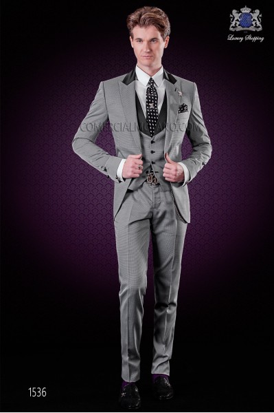 Italian fashion suit with modern cut "Slim" peak lapels and one button. Microdesign in gray fabric.