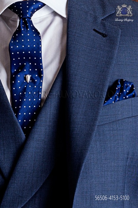 Étroite cravate et mouchoir bleu et pois blancs