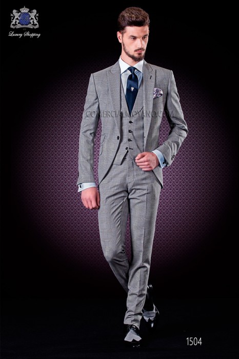 Costume italien avec "slim" revers de pointe modernes et un bouton. Tissu prince de Galles avec la conception mince ligne bleue