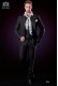 Italian black pinstripes wedding suit. Peak lapels and 1 button. Wool fabric.