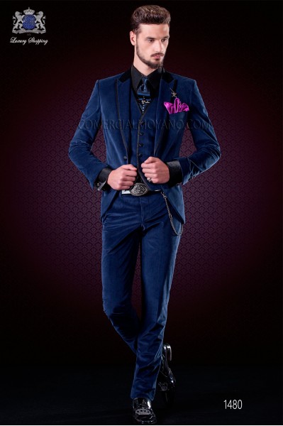 Italian blue velvet fashion suit. Black satin collar, peak lapels with satin trims and 1 button.