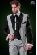 Italian patchwork suit pearl grey and black. Peak lapels and 1 button. Wool mix fabric.