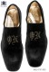 Black velvet shoes with embroidered crown