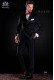 Cross tuxedo groom in black. Elegance and excellence in evening dress for men.