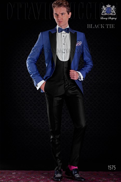Italian royal blue tuxedo with satin lapels. Peak lapels and 1 button. Wool mix fabric.