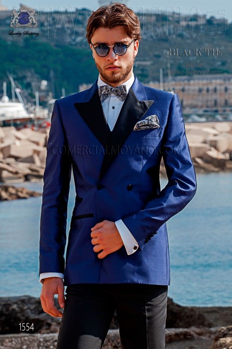 Tuxedo double breasted royal blue shantung with satin lapels. Peak lapels and 4 buttons. Shantung silk mix fabric.