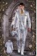 Baroque white satin frock coat with golden embroidery.