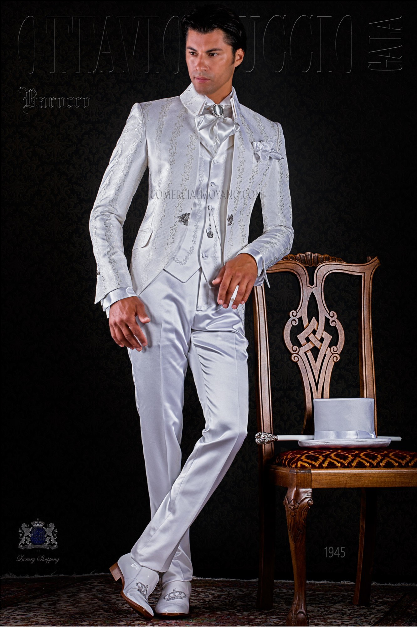 Baroque white brocade frock coat with crystal brooch.