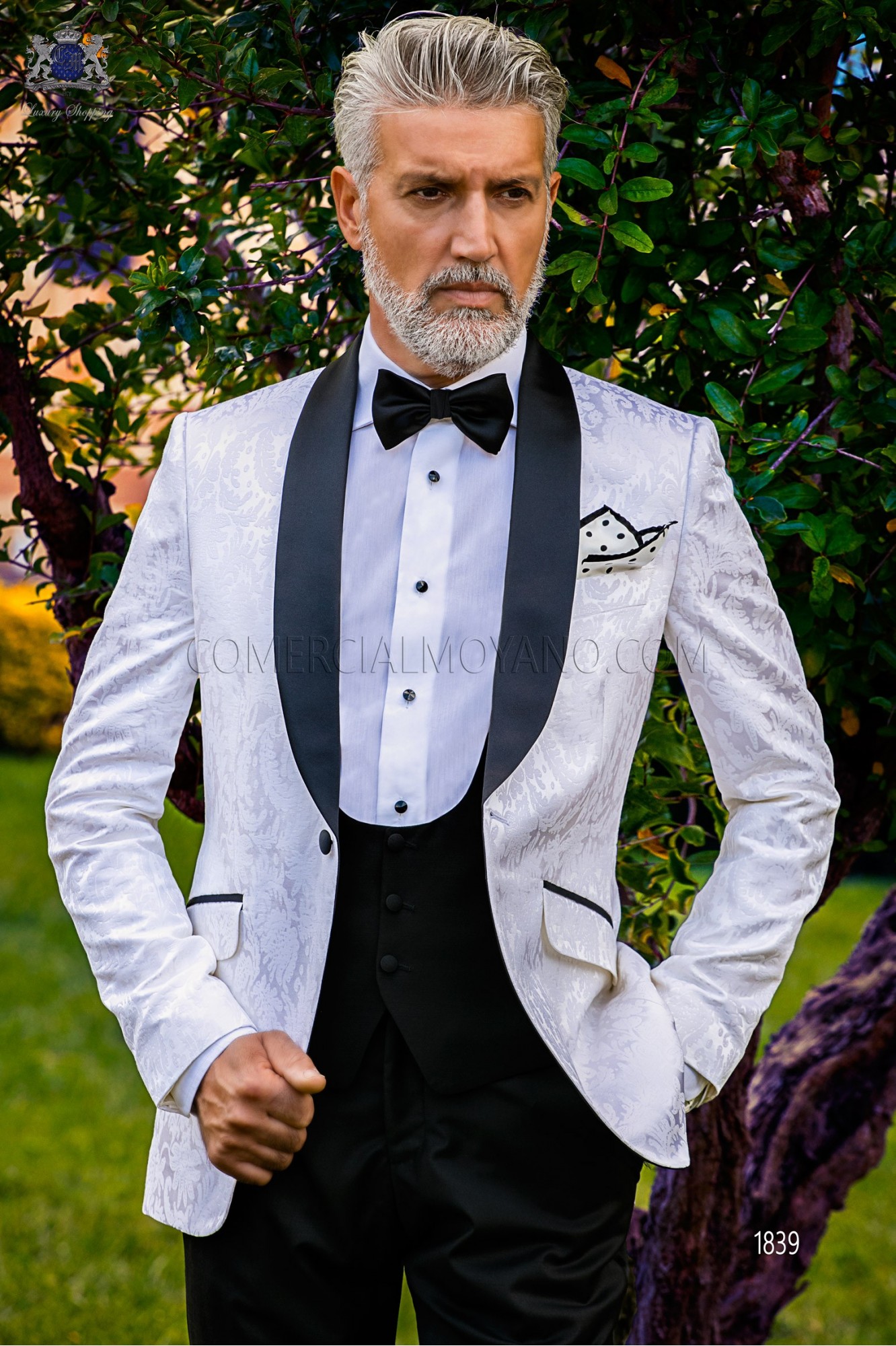 Bespoke black and white silk dinner jacket combined with a black trousers