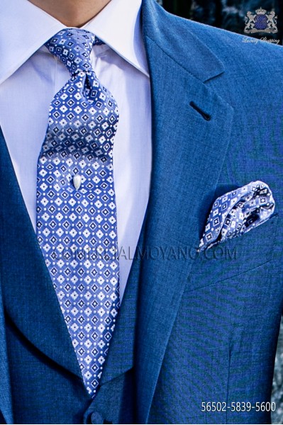 Tie and handkerchief set made from blue-white micro patterned silk.