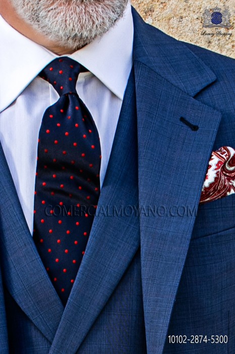 Corbata azul marina con topos rojos