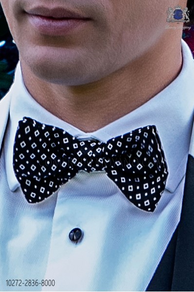 Black bow tie with white designs
