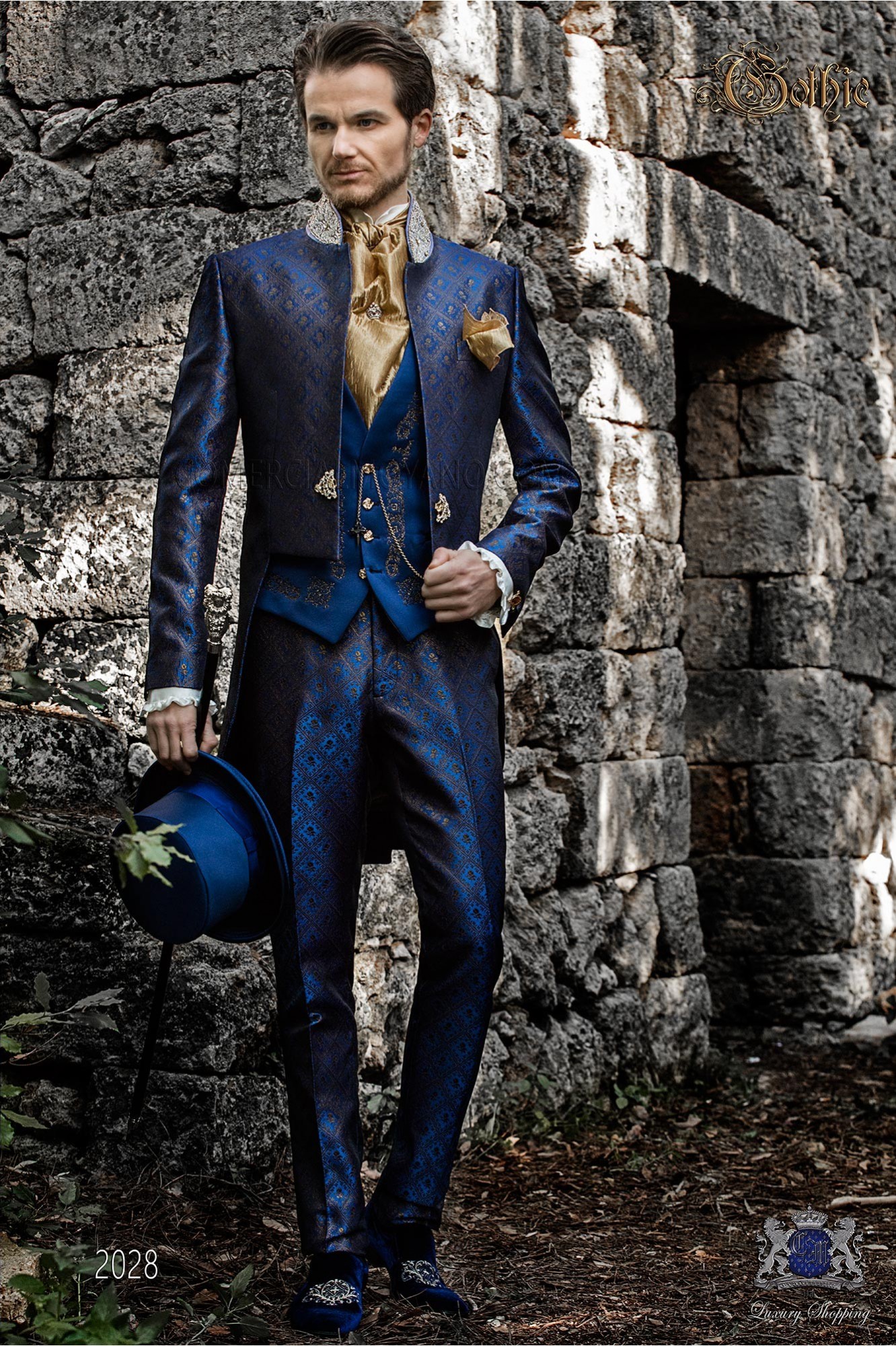 Baroque blue & gold brocade tail coat with crystal rhinestones on Mao collar. model 2028 Mario Moyano