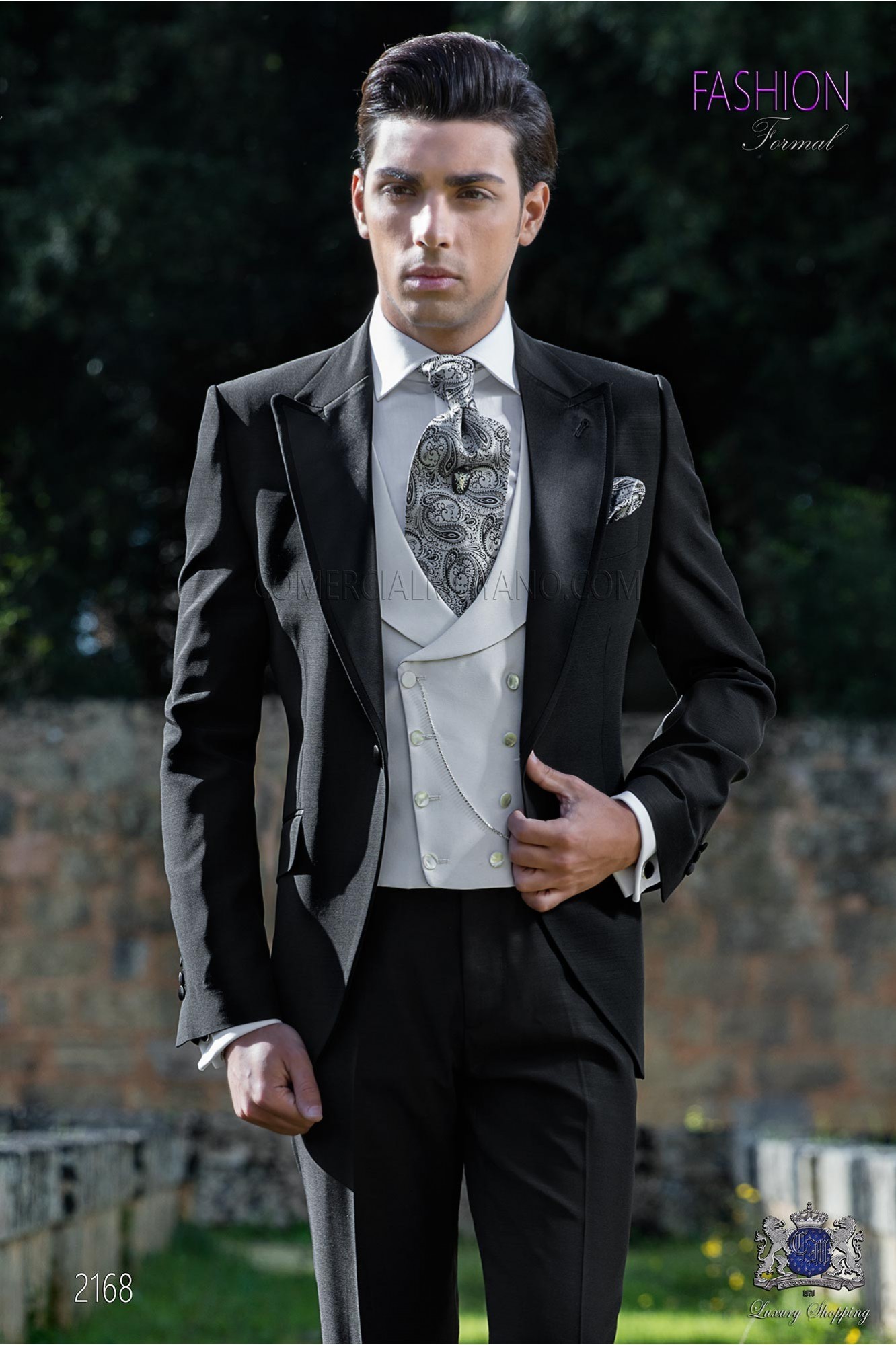 Italian wedding suit Slim stylish cut. Peak lapel with contrast fabric piping. Made from wool and acetate fabric in black. model 2168 Mario Moyano