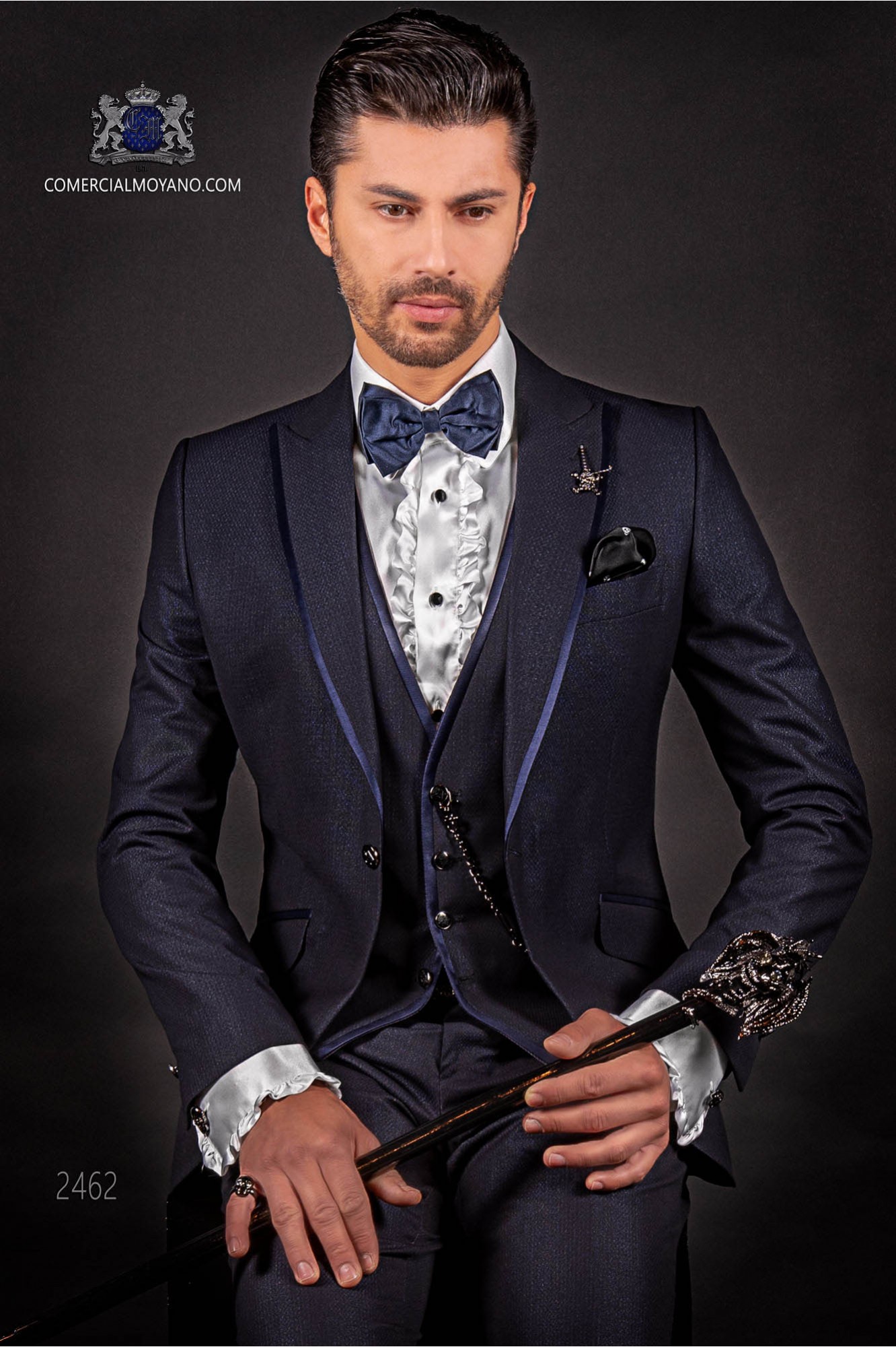 Italian dark blue shiny fashion suit. Peak lapels with satin trims and 1 button.