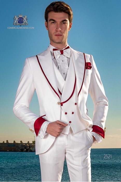 Traje de novio moderno blanco con con vivo rojo en la solapa
