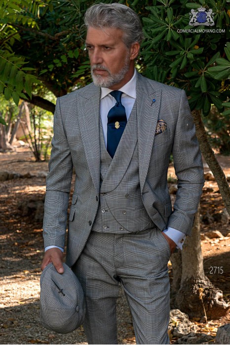 Grauer Hochzeitsanzug im eleganten Prince of Wales mit blauem Streifen