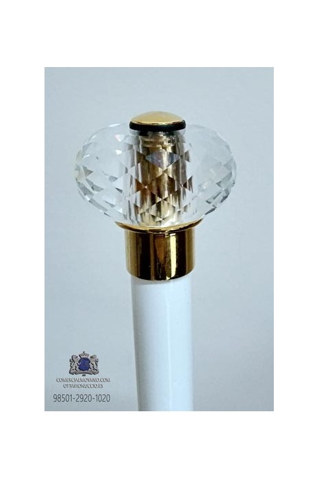 White cane with carved glass knob set in golden metal.