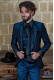 Blue rocker groom suit with black psychedelic brocade and black satin profile on lapels